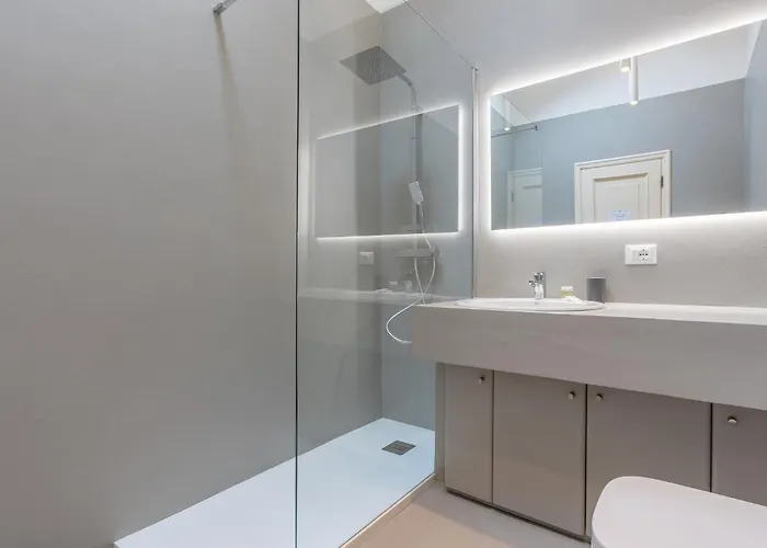 Guesthost - Pratello Elegante E Raffinata Mansarda Appartement